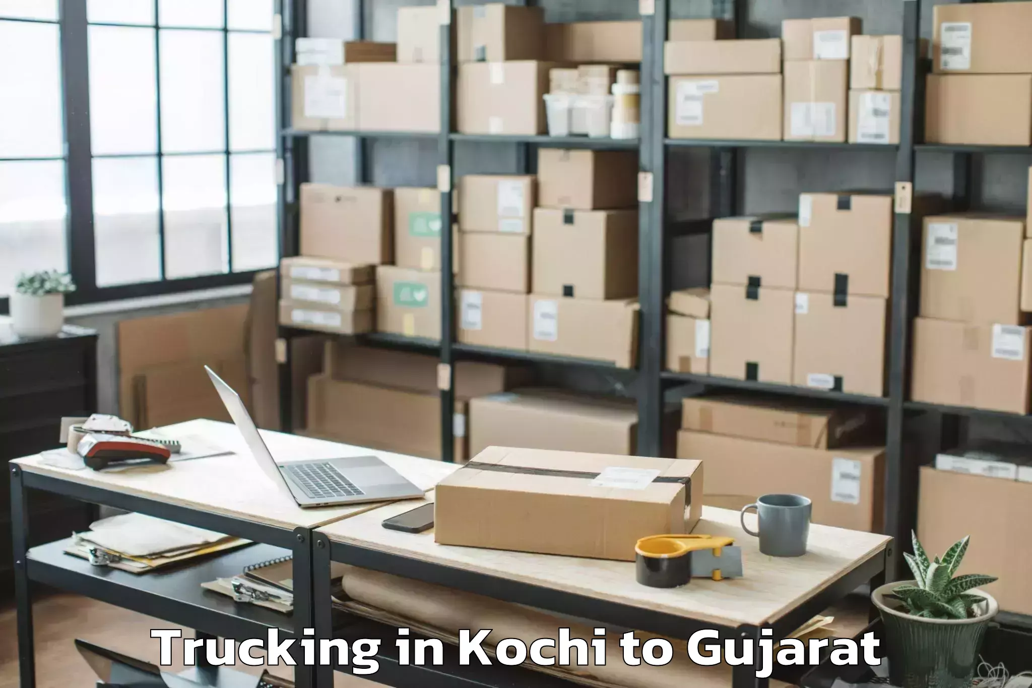 Kochi to Jhulasan Trucking